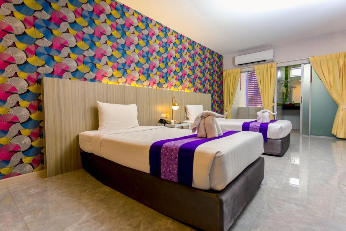 Embryo Hotel Паттайя Экстерьер фото